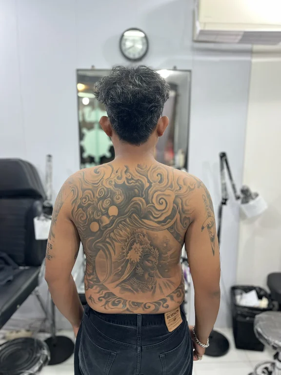 ornamental balinese dragon balinese pattern wave linework heavy shading phoenix tattoo Canggu Bali