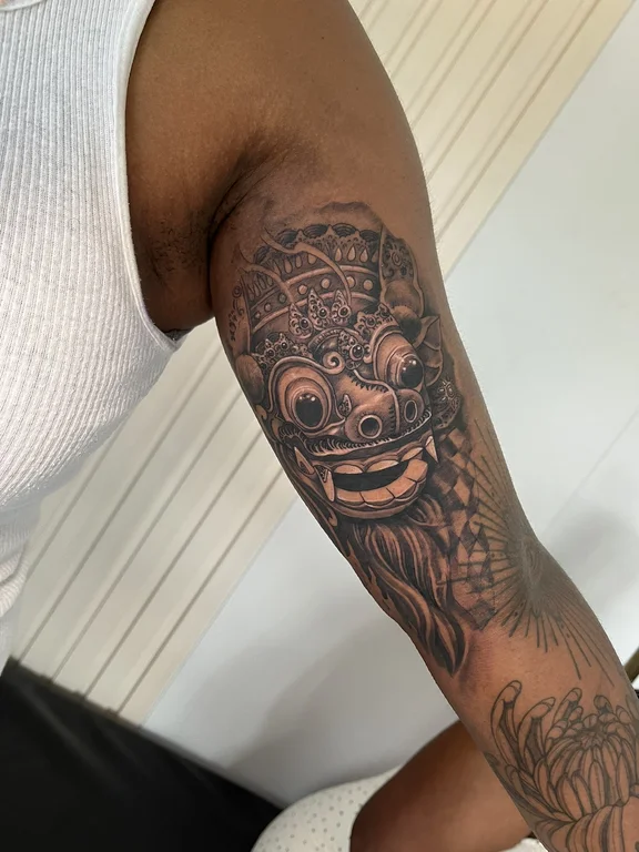 abstract balinese mask balinese pattern cloud deity polynesian heavy shading tattoo Canggu Bali