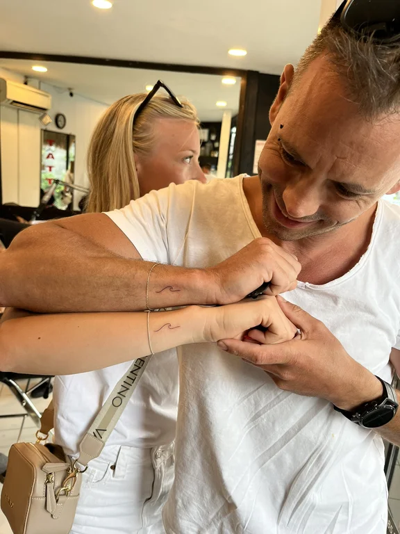 symbol balinese snake fine line elegant bold line thin line linework tattoo Canggu Bali