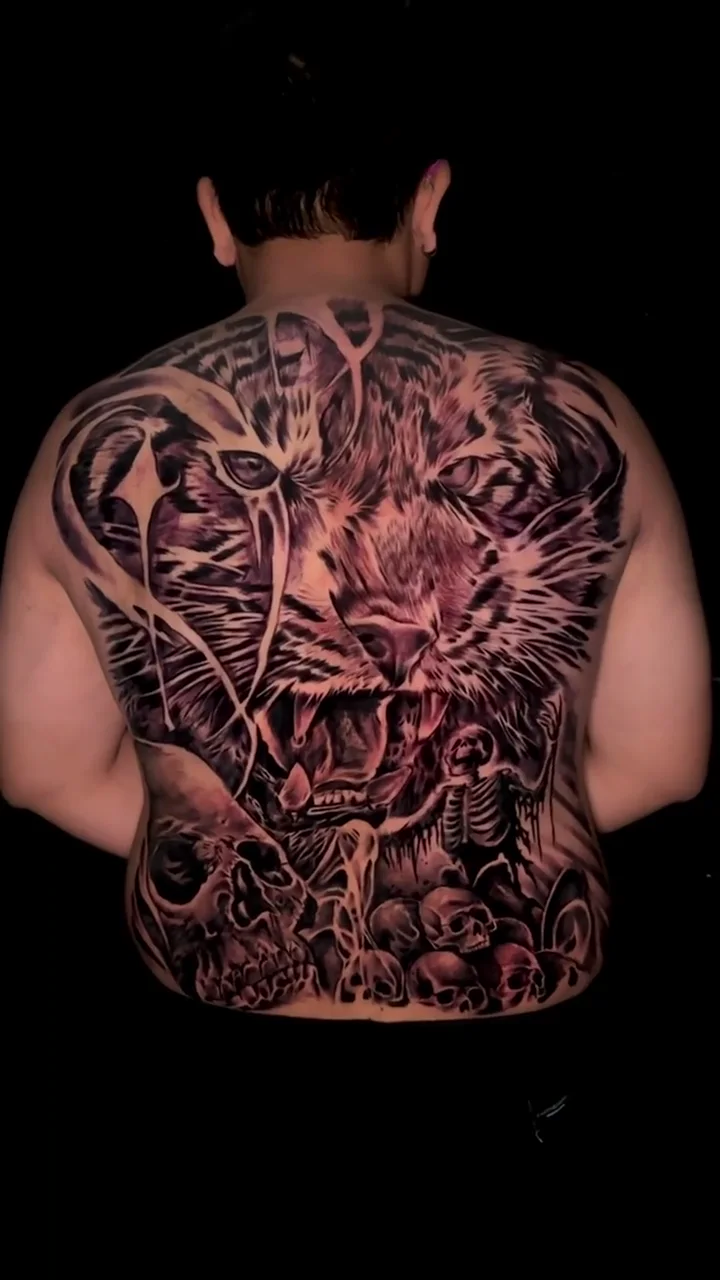 tiger snake skulls angle 02 full back big tattoo tattoo canggu bali