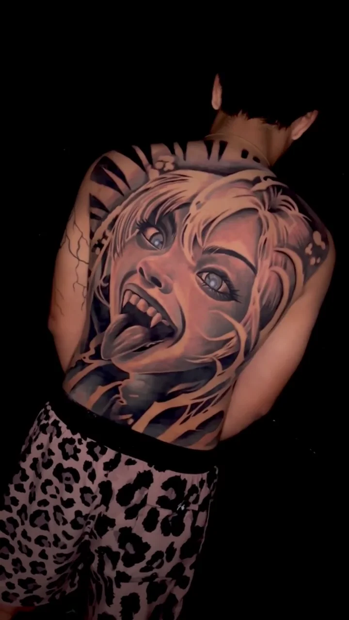 woman portrait tongue angle 01 full back big tattoo tattoo canggu bali