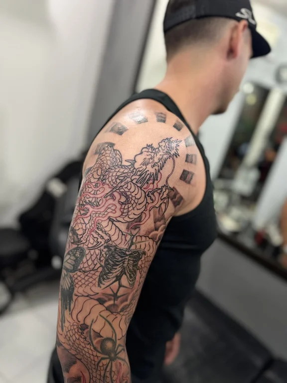 deity heavy shading cloud linework black grey man full fullsleeve full sleeve tattoo canggu bali