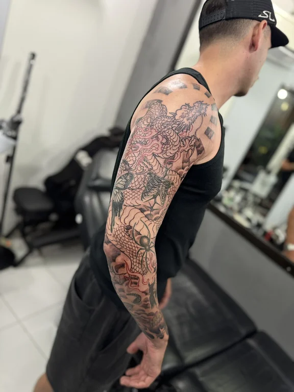 koi linework elegant soft shading peony heavy shading full fullsleeve full sleeve tattoo canggu bali