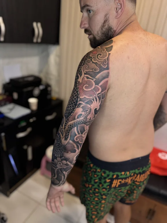 snake heavy shading wave dragon koi fire full full sleeve fullsleeve tattoo canggu bali
