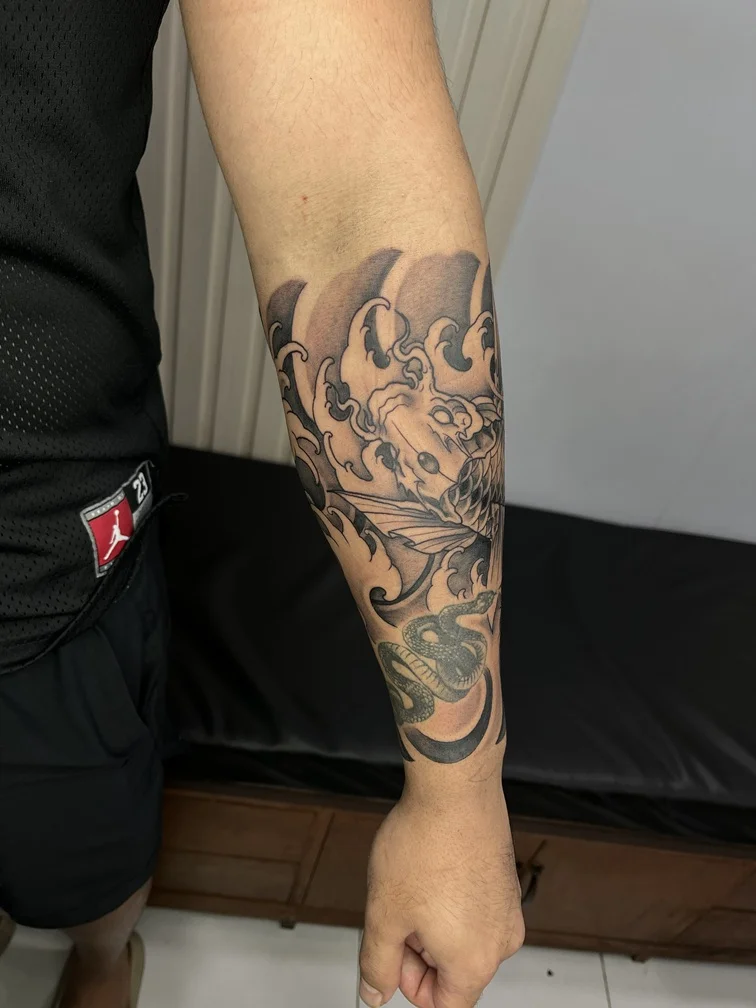japanese koi fish half halfsleeve half sleeve man hand tattoo canggu bali