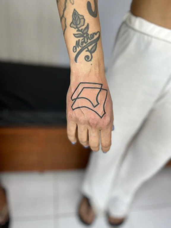 geometric fine line hand bold line minimal linework man thin line tattoo Canggu Bali