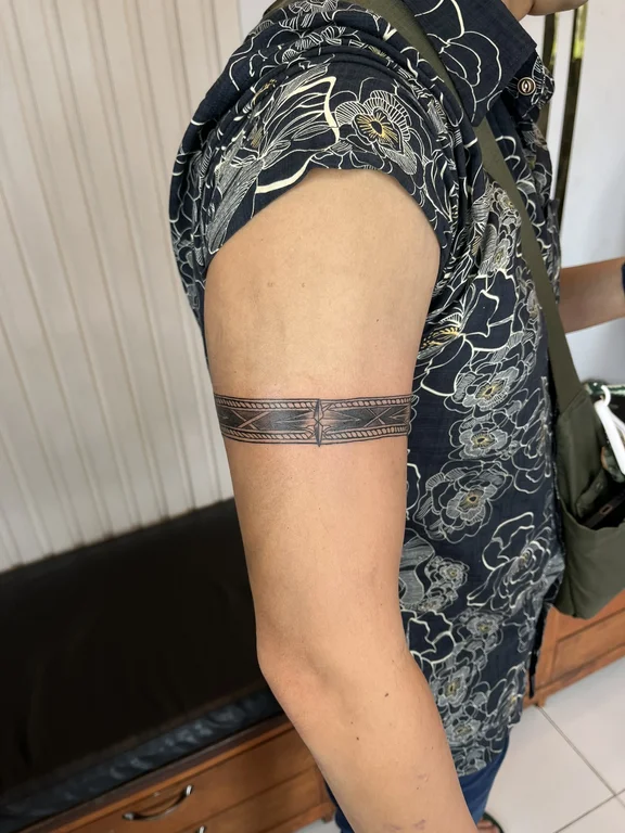 abstract blackwork snake fine line elegant thin line linework black grey tattoo Canggu Bali
