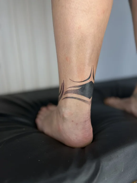 geometric minimalist snake fine line minimal thin line bold line linework tattoo Canggu Bali
