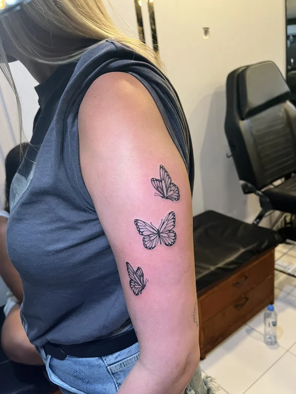 nature blackwork butterfly dotwork elegant soft shading linework black grey tattoo Canggu Bali