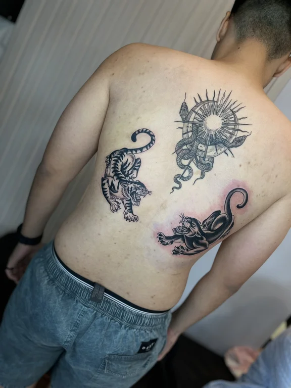animal blackwork dragon dotwork moon black grey linework sun tattoo Canggu Bali