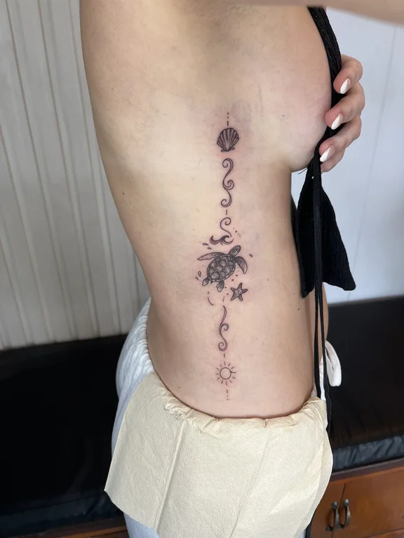 abstract blackwork lotus dotwork elegant moon soft shading fine line tattoo Canggu Bali