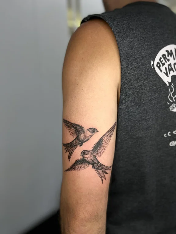 animal blackwork phoenix black grey elegant dotwork soft shading linework tattoo Canggu Bali