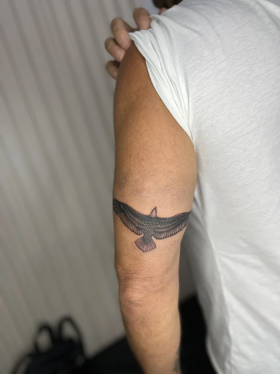 black grey dotwork fine line elegant tattoo man hand eagle animal tattoo canggu bali