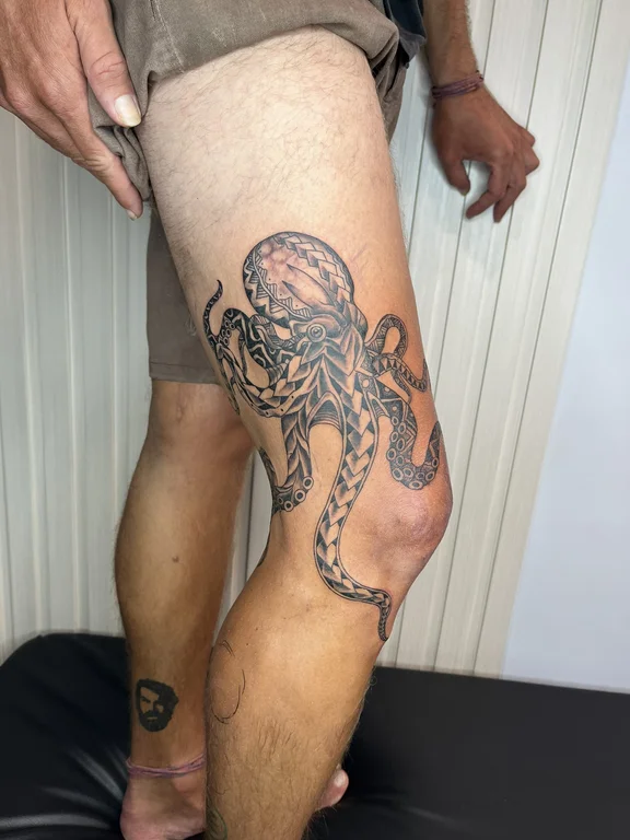 black grey man dotwork octopus sea animal foot tattoo shading tattoo canggu bali