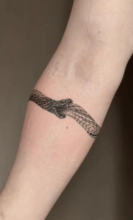 snake dotwork elegant minimal fine line animal black man hand tattoo canggu bali