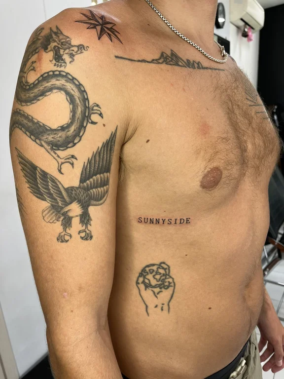 mythology blackwork snake linework fire lion dragon fine line tattoo Canggu Bali