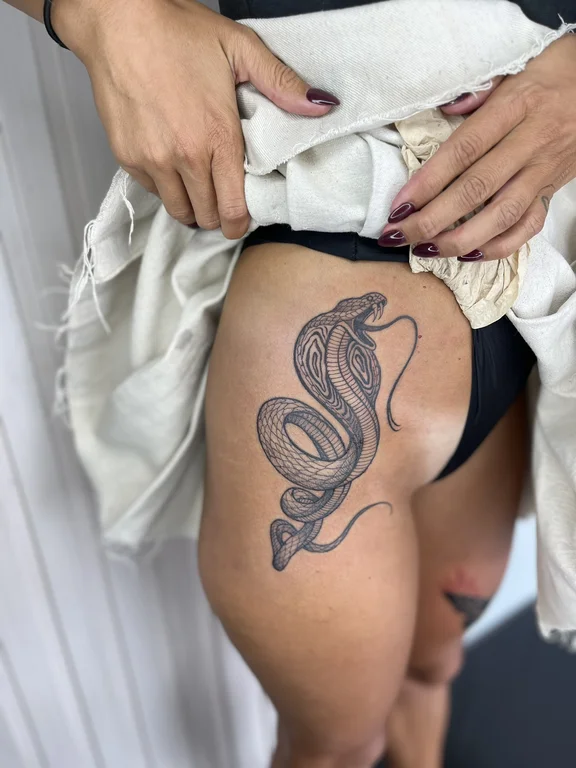 snake linework dotwork elegant fine line animal tattoo woman tattoo canggu bali