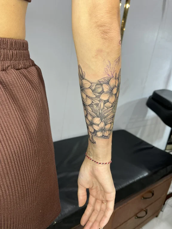 geometric blackwork lotus dotwork elegant spiritual soft shading sacred geometry tattoo Canggu Bali