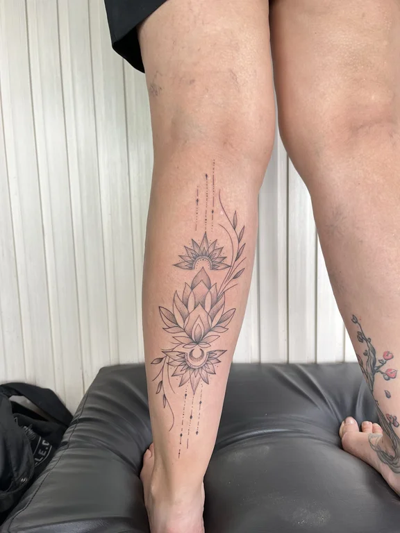 floral blackwork lotus dotwork spiritual linework elegant mystical tattoo Canggu Bali