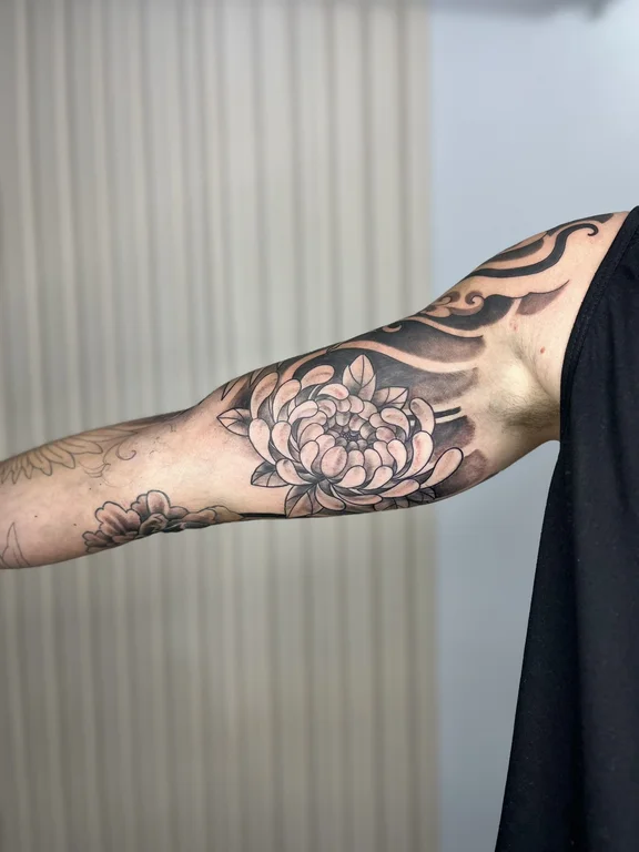 floral blackwork peony black grey elegant heavy shading soft shading linework tattoo Canggu Bali