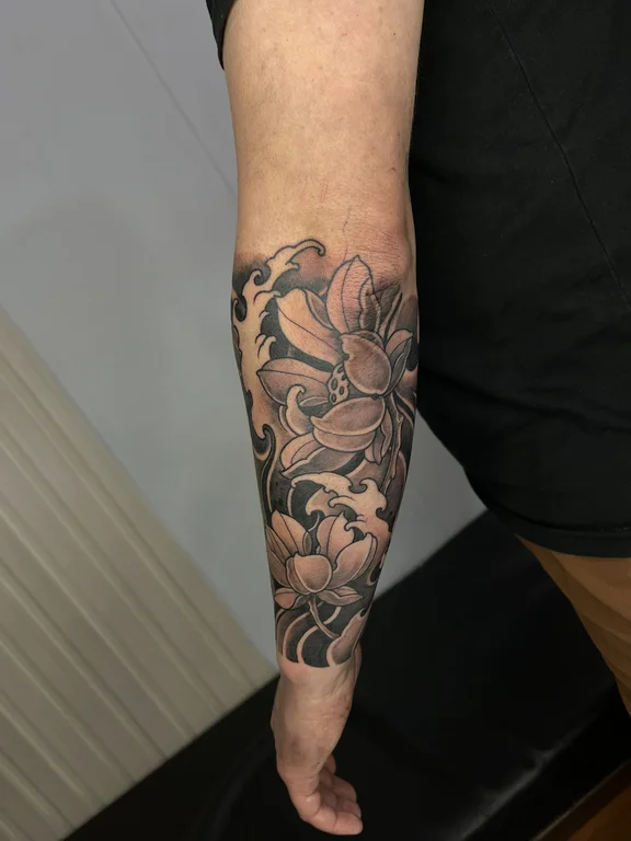 floral blackwork peony black grey elegant linework heavy shading soft shading tattoo Canggu Bali