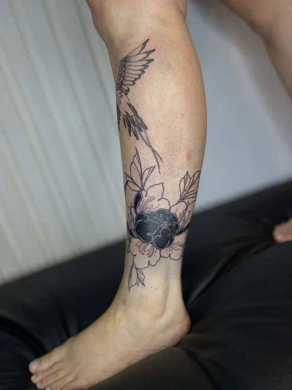 floral blackwork peony black grey elegant soft shading linework dotwork tattoo Canggu Bali