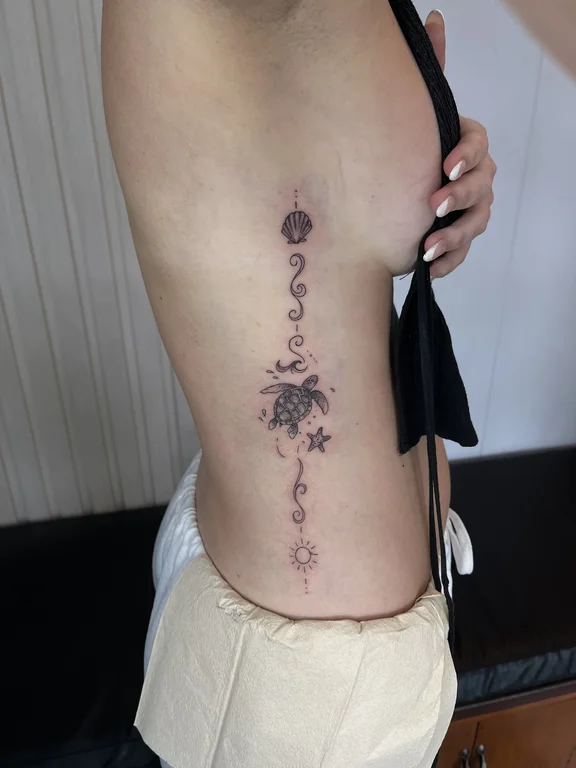 floral blackwork rose soft shading elegant dotwork fine line lotus tattoo Canggu Bali