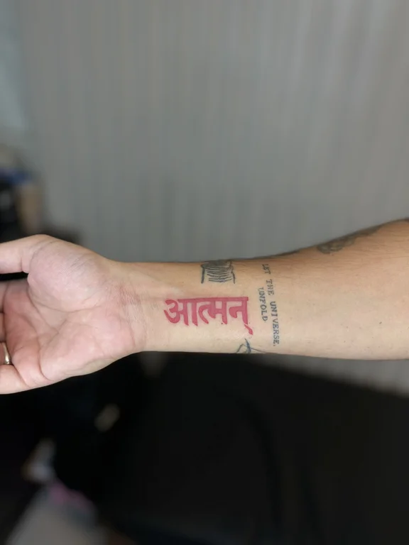 lettering minimalist buddha bold line spiritual fine line soft shading deity tattoo Canggu Bali