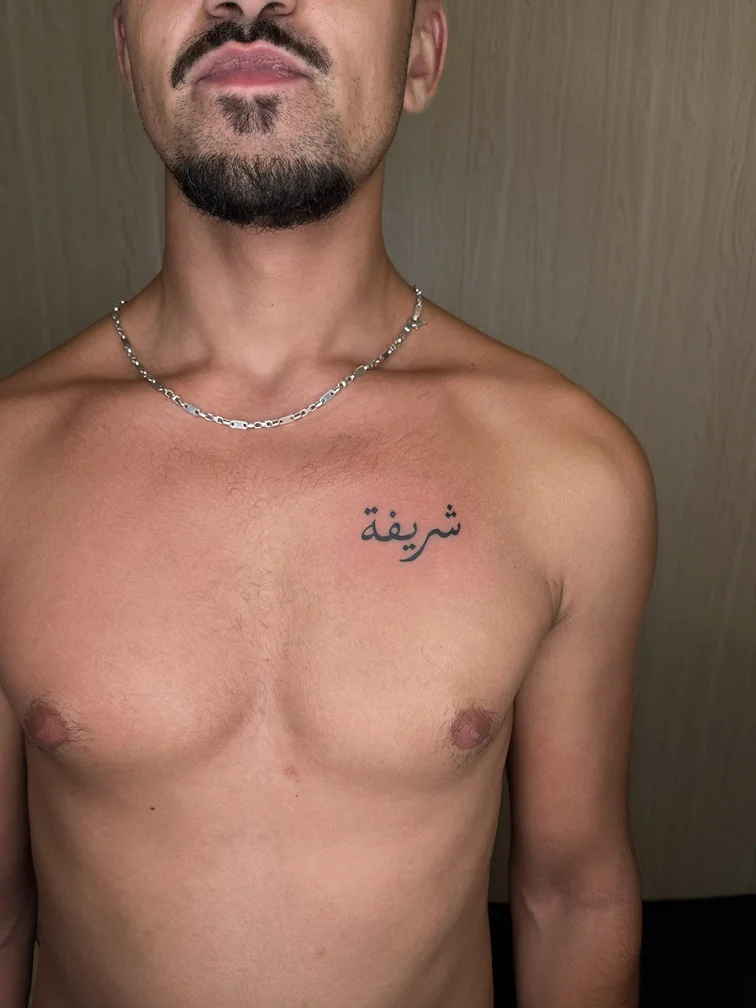 line black lettering man tattoo linework arabic tattoo canggu bali