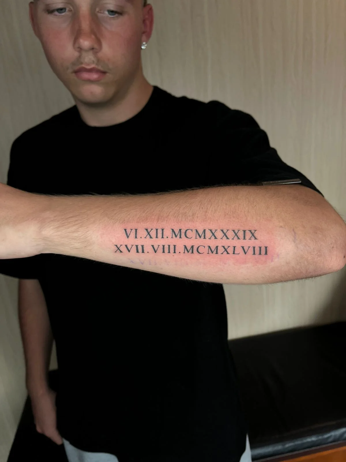 man hand roman roman numerals black black work blackwork line fine line line work tattoo canggu bali