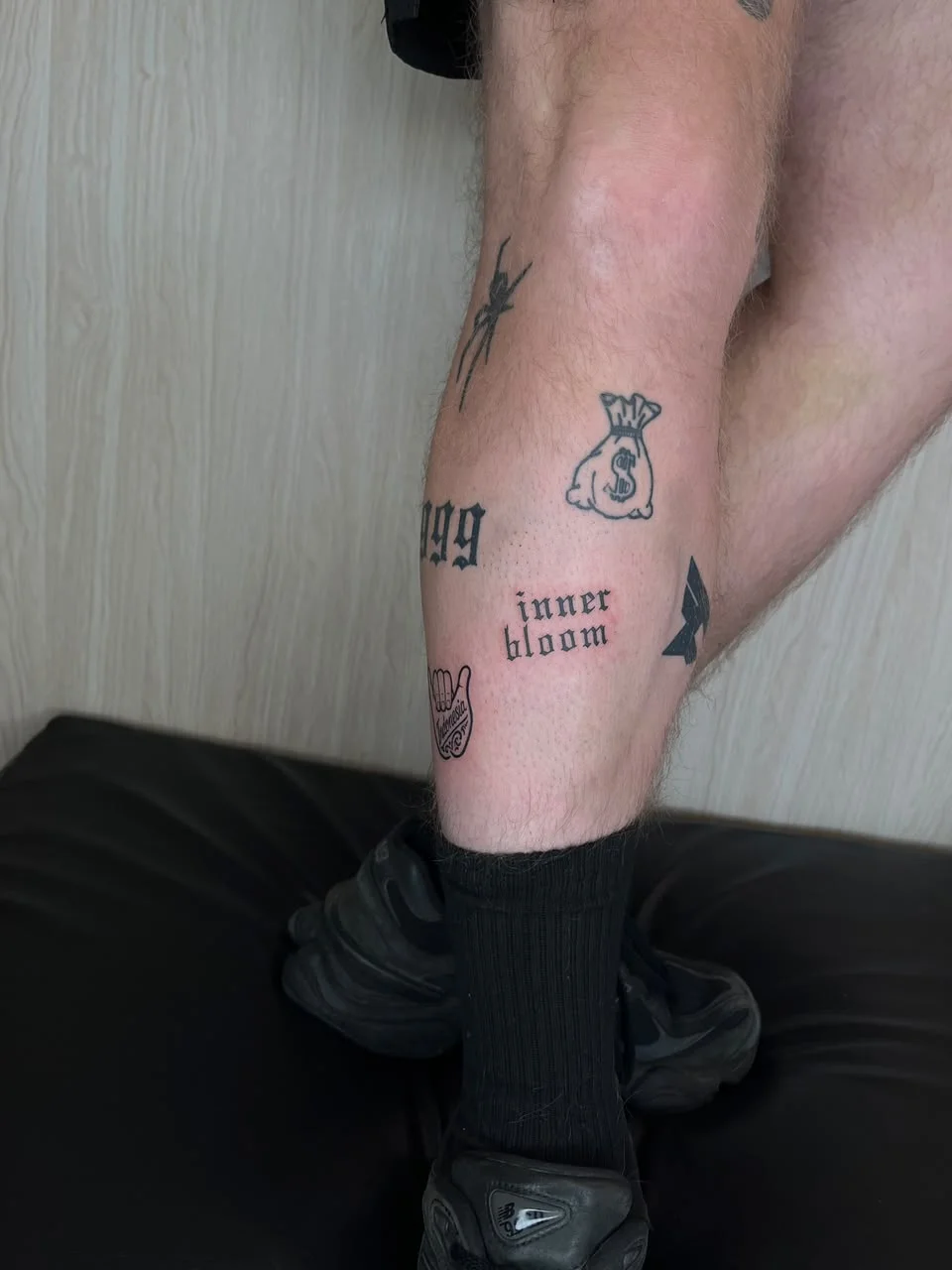 man leg foot lettering blackwork black fine line line work line tattoo canggu bali