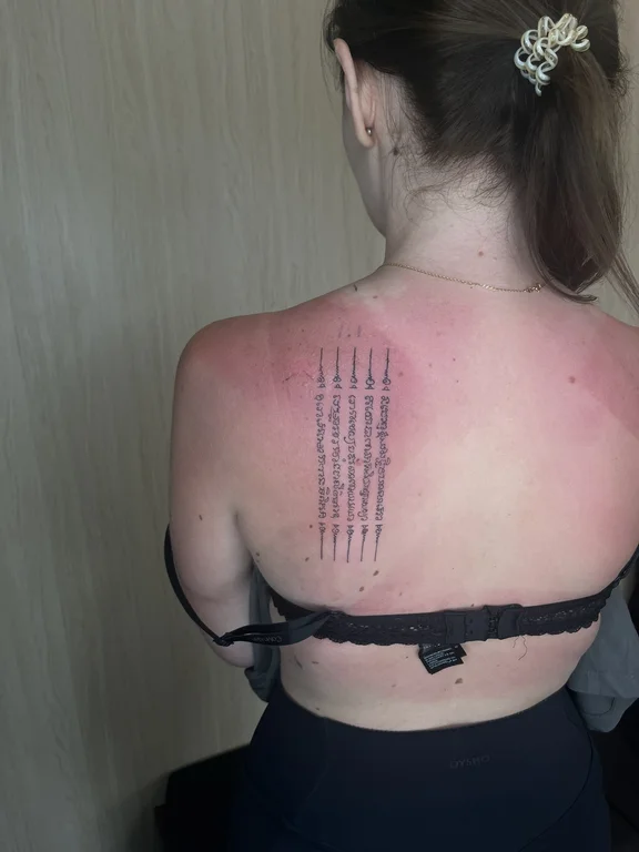 lettering blackwork woman fine line gothic thin line bold line spiritual tattoo Canggu Bali
