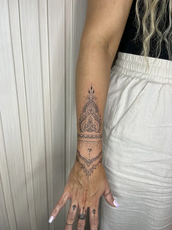 mandala blackwork deity dotwork spiritual balinese pattern elegant sacred geometry tattoo Canggu Bali