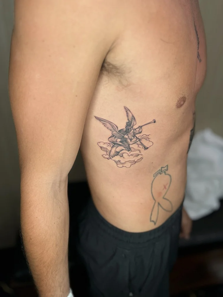 angel man tattoo black blackwork shading mythology elegant tattoo canggu bali