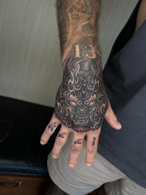 mythology blackwork hand black grey dark heavy shading linework elegant tattoo Canggu Bali