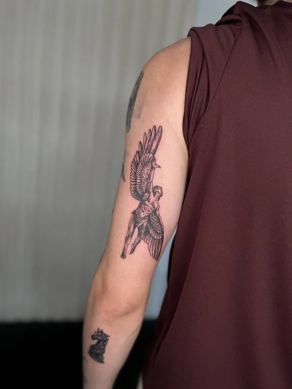 mythology blackwork phoenix black grey elegant angel linework soft shading tattoo Canggu Bali