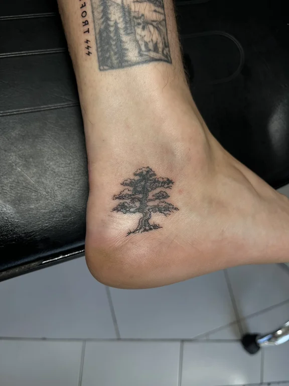 nature blackwork man black grey elegant soft shading fine line dotwork tattoo Canggu Bali