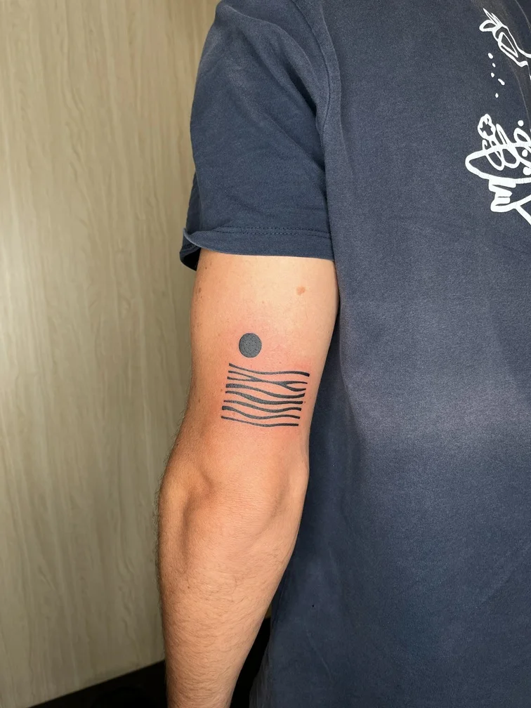 wave black line blackwork dotwork tattoo nature man hand tattoo canggu bali