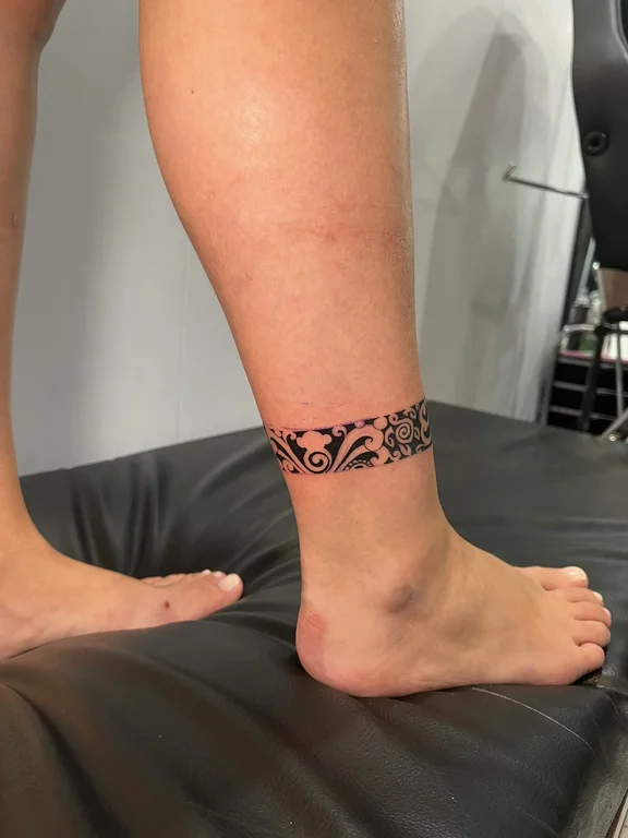 ornamental blackwork lotus polynesian elegant tribal pattern linework dotwork tattoo Canggu Bali