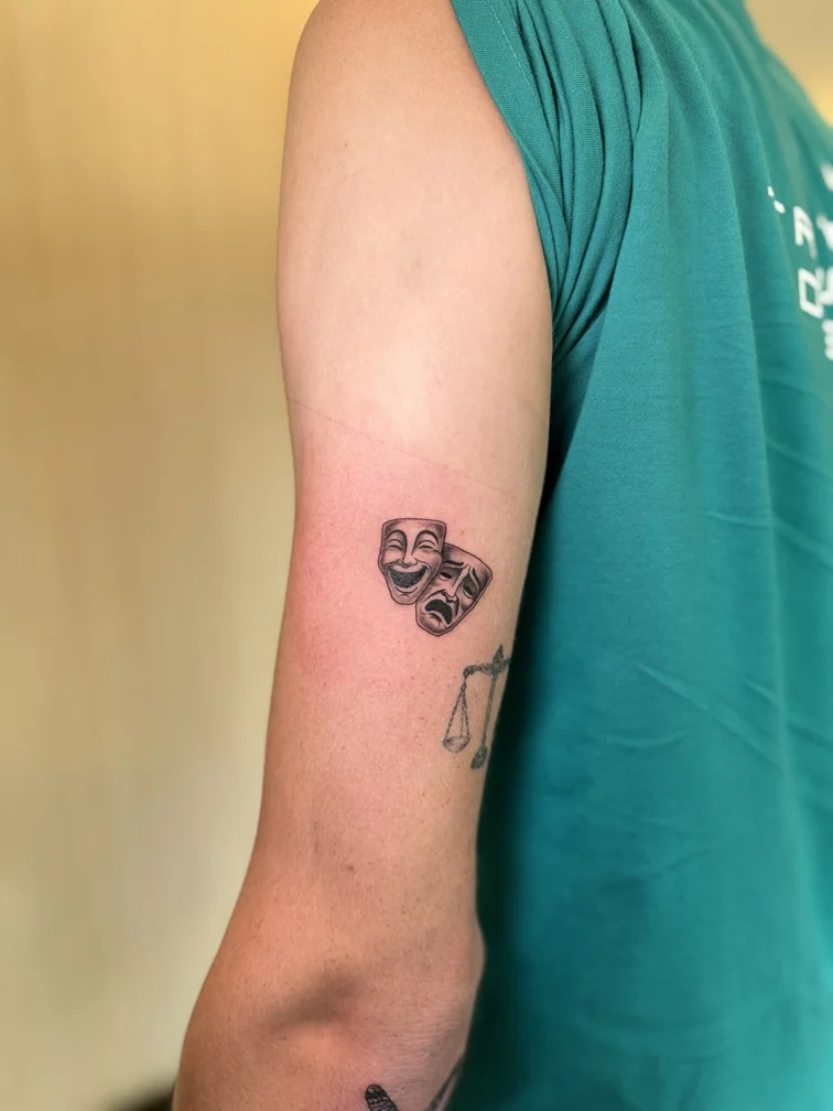 blackwork black face man hand tattoo mask happy tattoo canggu bali