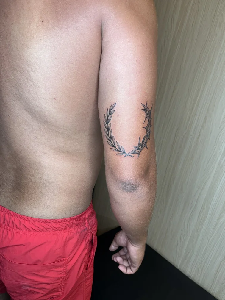 man hand blackwork religious black grey shading tattoo canggu bali