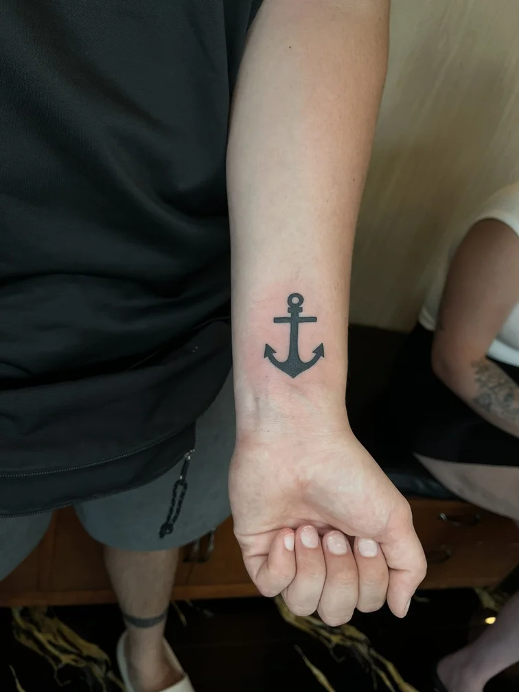 anchor man hand black blackwork tattoo fine line tattoo canggu bali