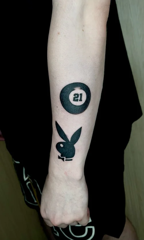 man hand rabbit ball blackwork symbol black tattoo canggu bali