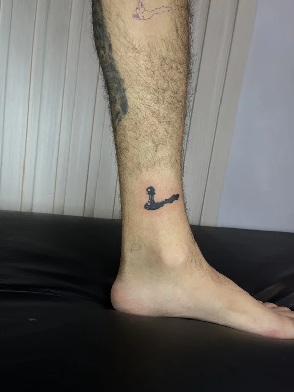 animal minimalist snake fine line wave minimal man soft shading tattoo Canggu Bali