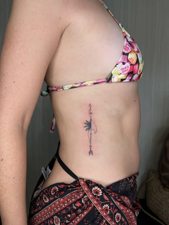 abstract blackwork woman fine line sun linework bold line dotwork tattoo Canggu Bali