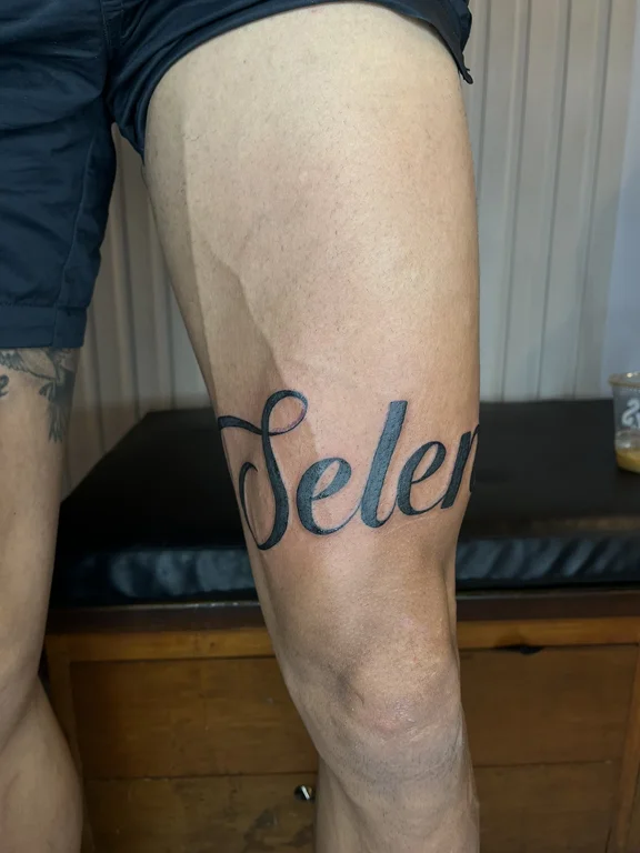 lettering fine line man bold line elegant soft shading black grey heavy shading tattoo Canggu Bali