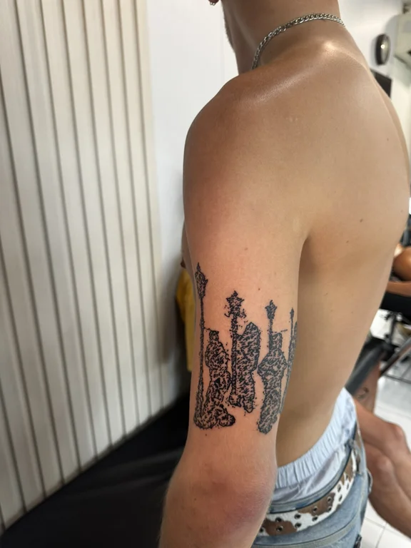 abstract dotwork deity linework spiritual balinese pattern black grey fire tattoo Canggu Bali