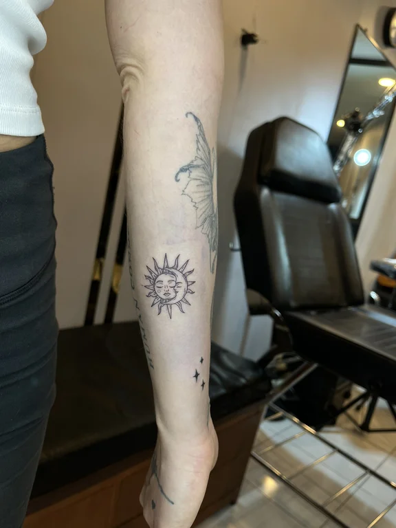 abstract dotwork lotus black grey sun mystical spiritual linework tattoo Canggu Bali