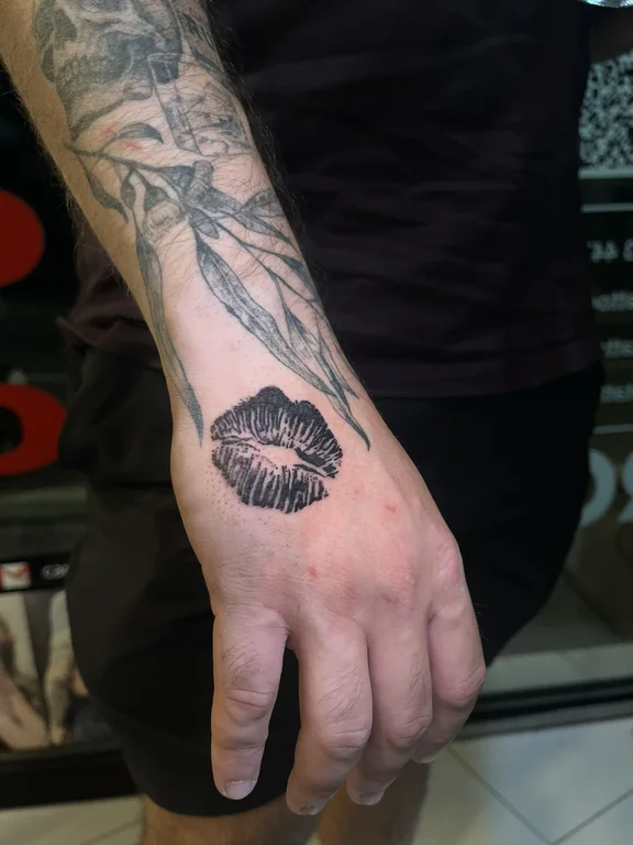 nature dotwork peony black grey leaf hand man linework tattoo Canggu Bali