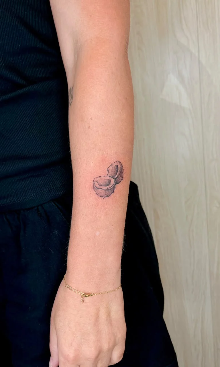 woman hand coconut dot work simple small symbol fine line line work line black tattoo canggu bali